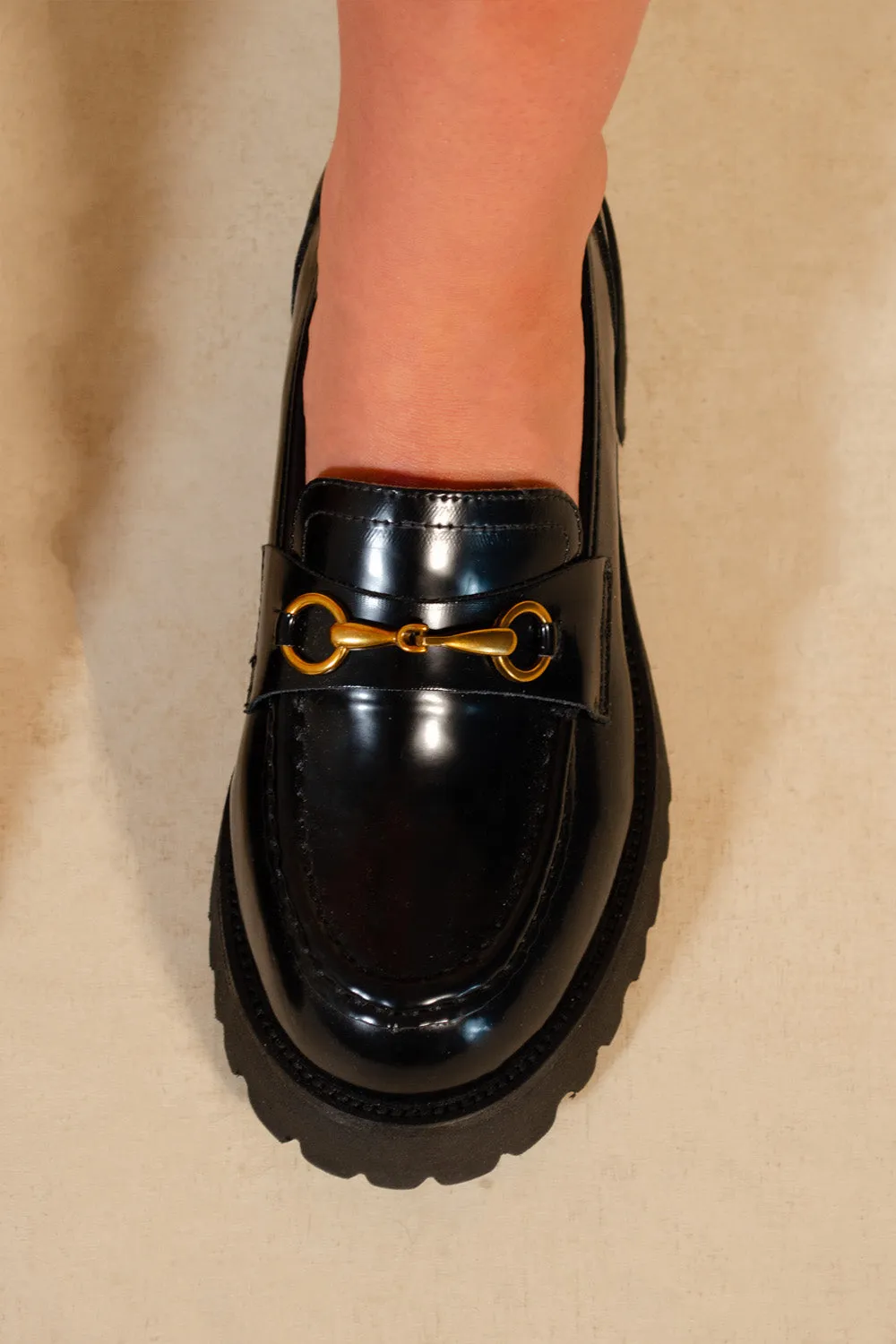 MURIEL CHUNKY SOLE SLIP ON LOAFERS WITH METAL DETAIL IN BLACK HIGH SHINE